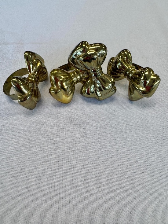 Source Unknown Other - Brass Bow Napkin Rings Vintage 80's Set of Four